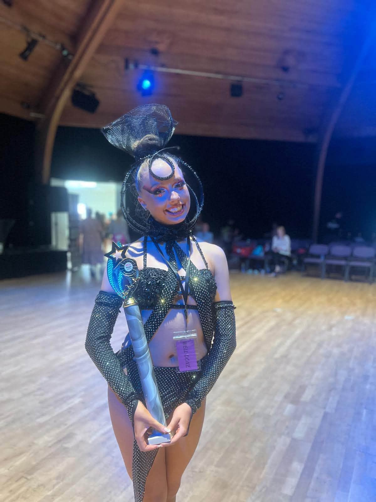 Solo dancer with trophy