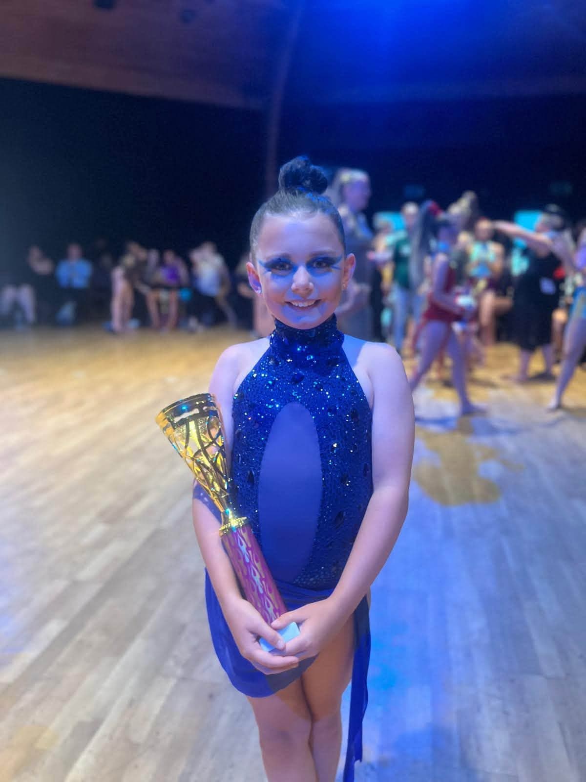 Solo dancer in blue costume